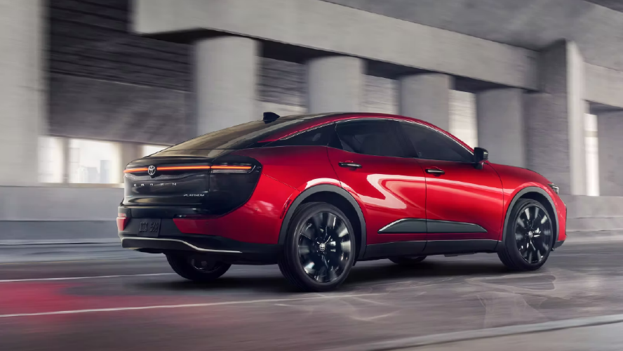 Red vehicle driving by