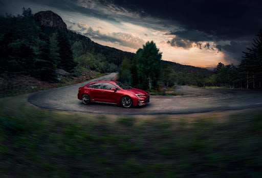 Red Toyota Car on Streets